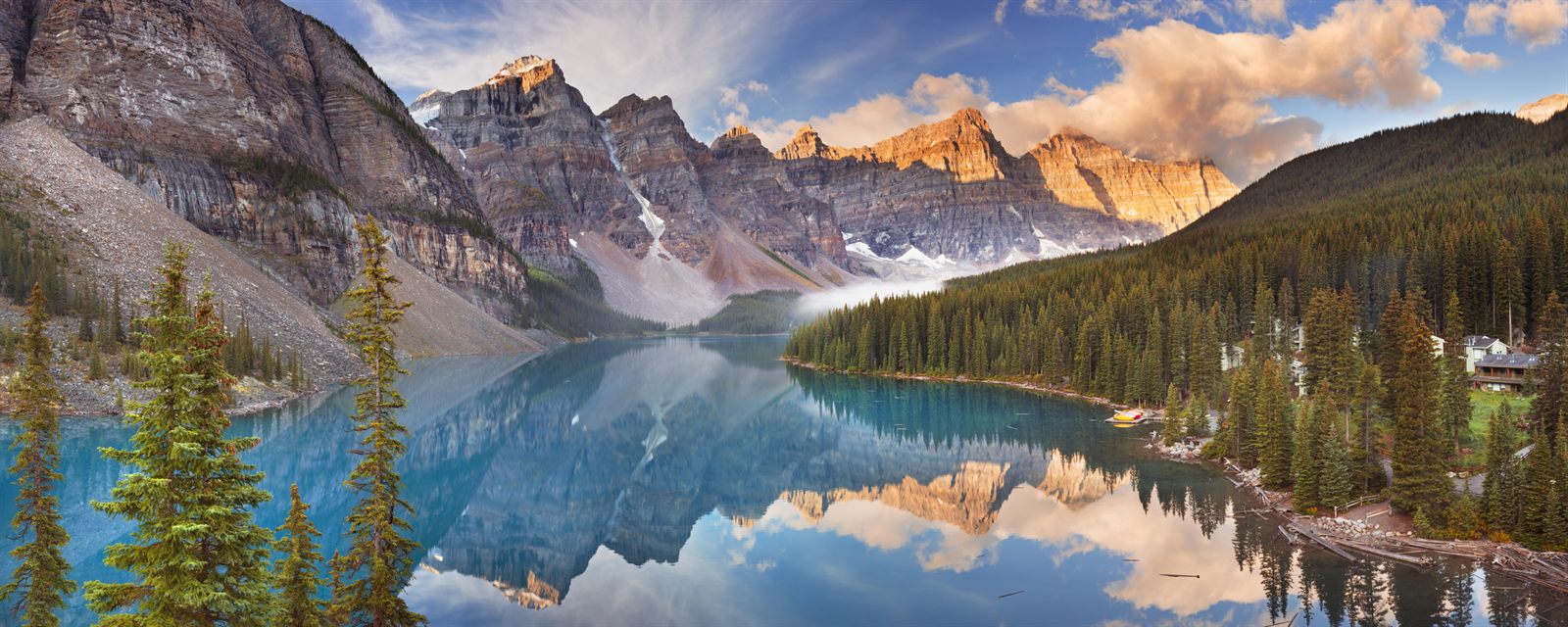 Turquoise Moraine Lake below a ring of rugged peaks in the Canadian Rockies